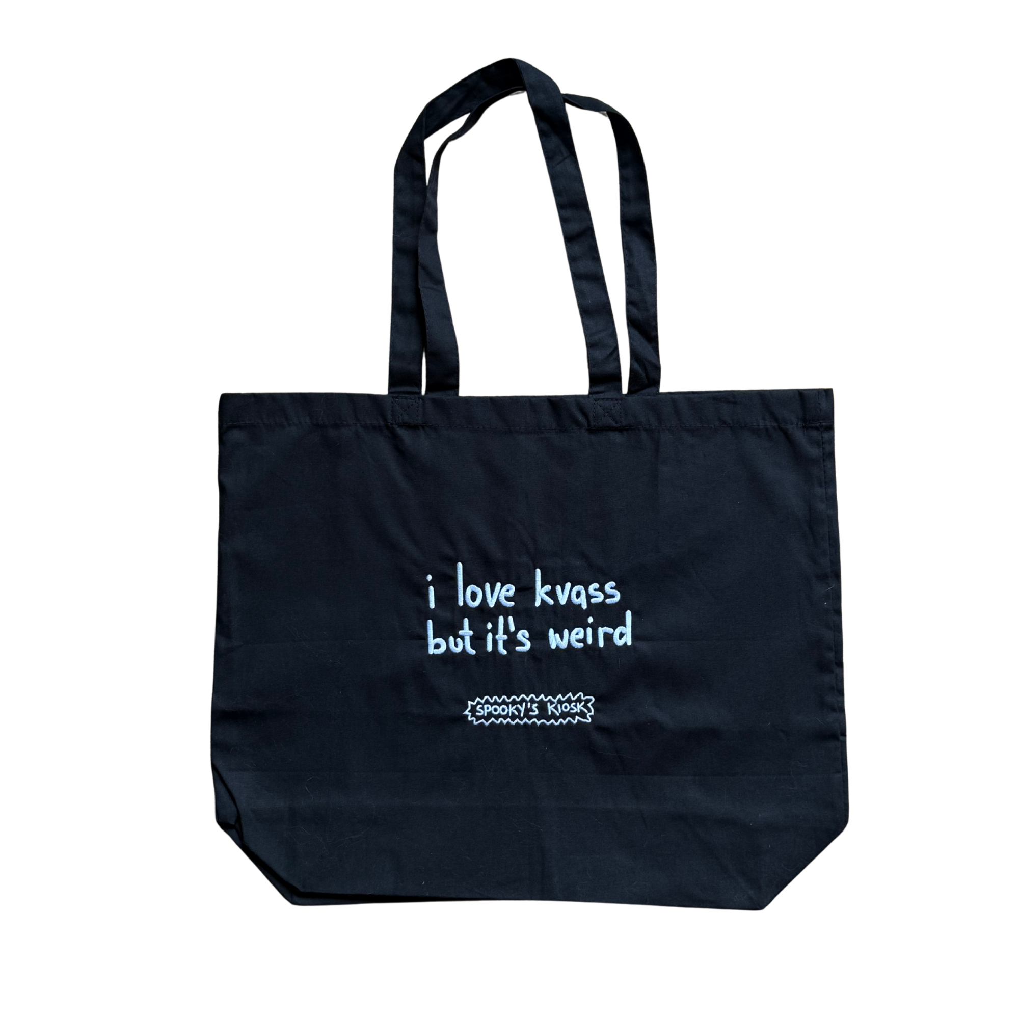 Black tote bag with white text on a white background